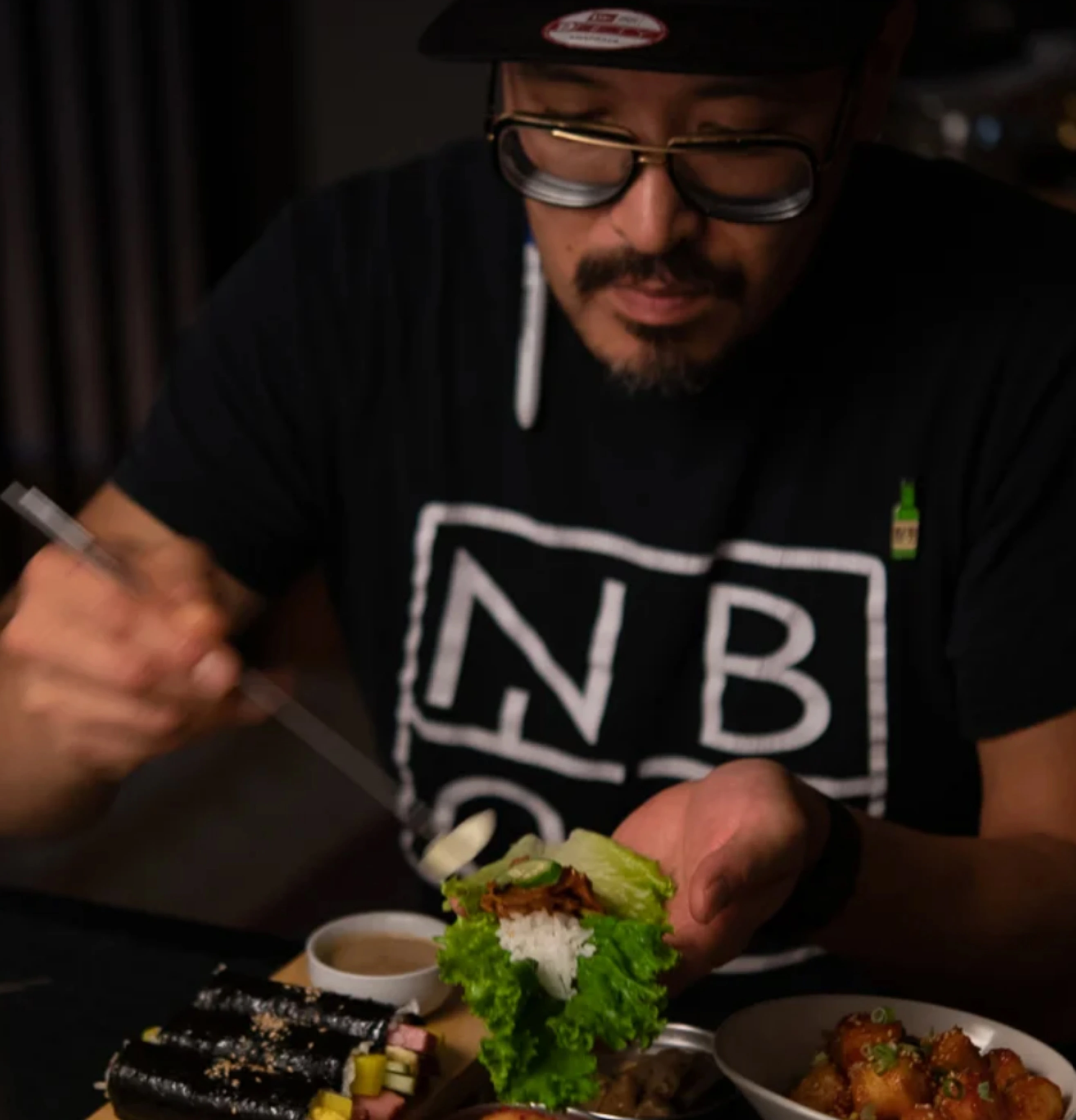 Image of chef plating food